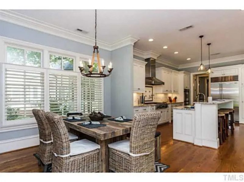 Traditional Craftsman house Plan with 4 Beds, 3 Garage Bays, and Vaulted Ceilings