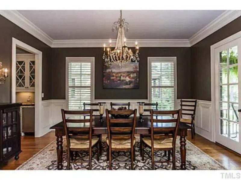 Traditional Craftsman house Plan with 4 Beds, 3 Garage Bays, and Vaulted Ceilings