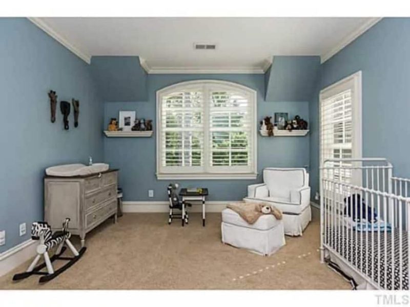 Traditional Craftsman house Plan with 4 Beds, 3 Garage Bays, and Vaulted Ceilings