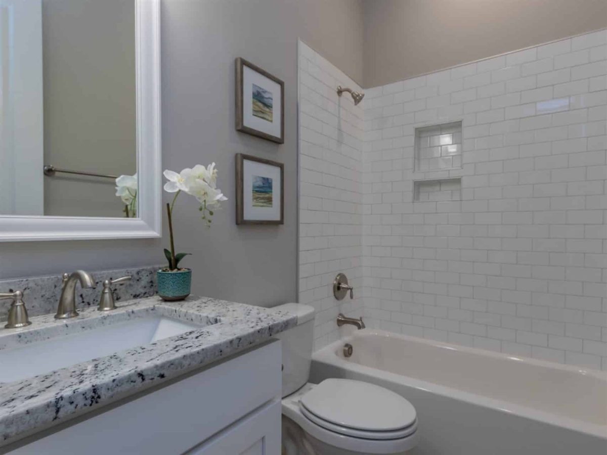 Charming 1.5 Story Barn-Style house Plan with 4 Bedrooms