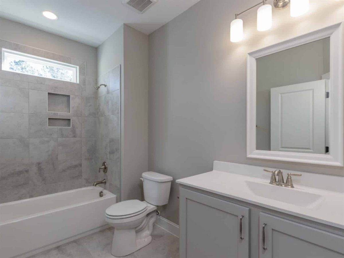 Charming 1.5 Story Barn-Style house Plan with 4 Bedrooms