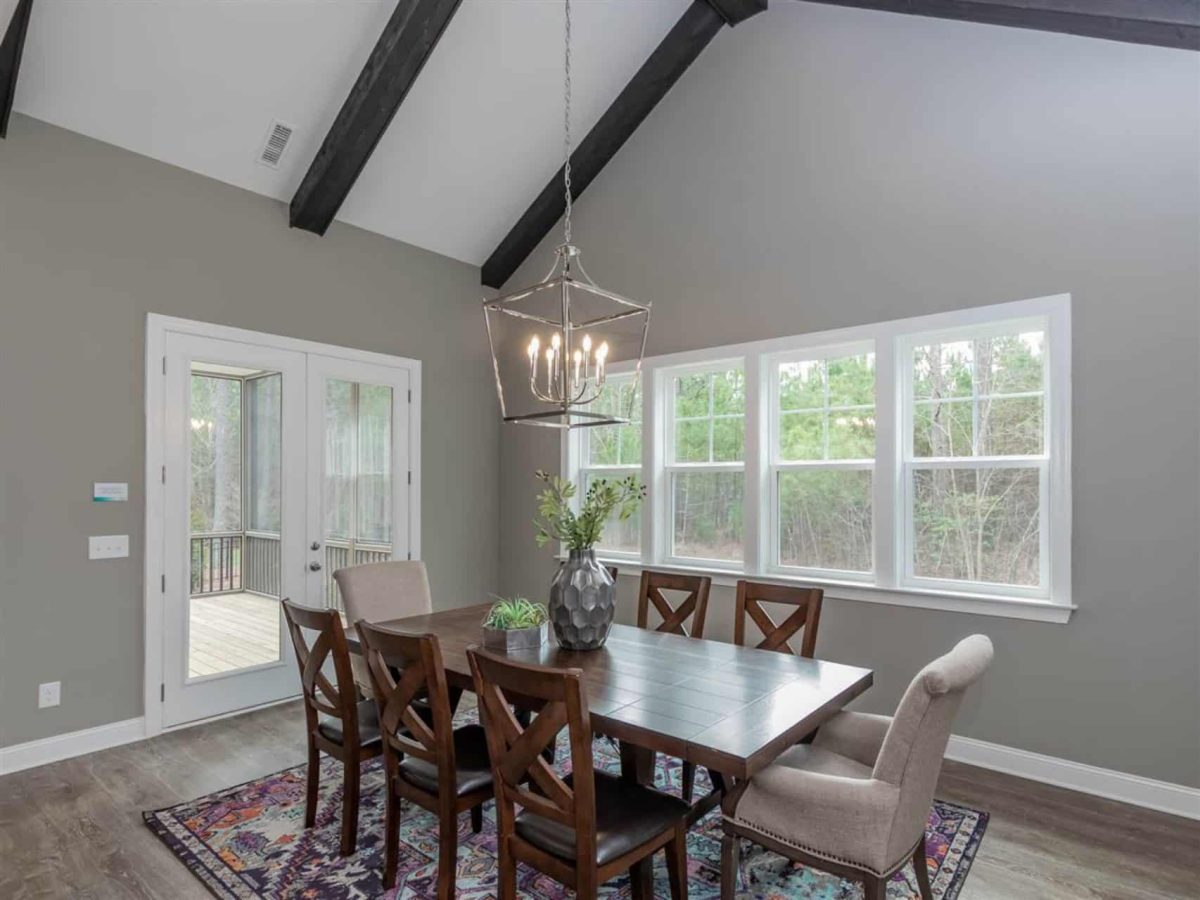 Charming 1.5 Story Barn-Style house Plan with 4 Bedrooms