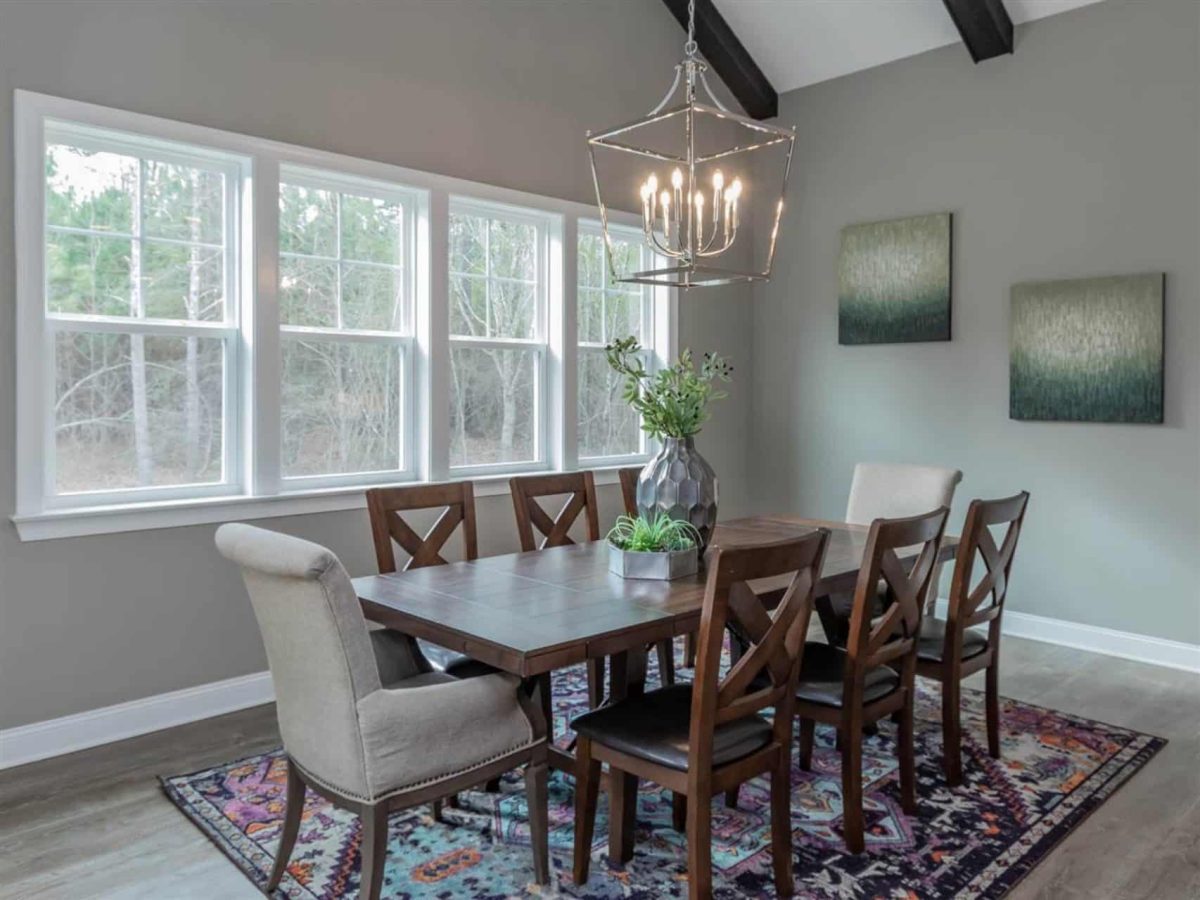 Charming 1.5 Story Barn-Style house Plan with 4 Bedrooms