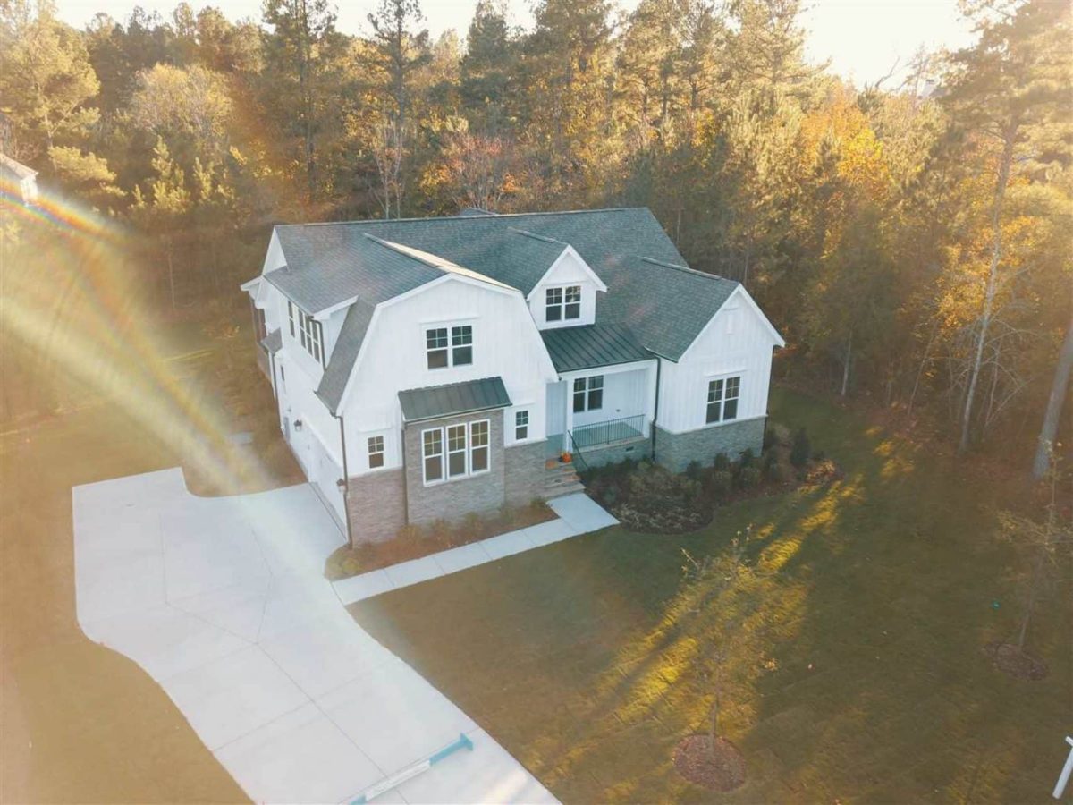 Charming 1.5 Story Barn-Style house Plan with 4 Bedrooms