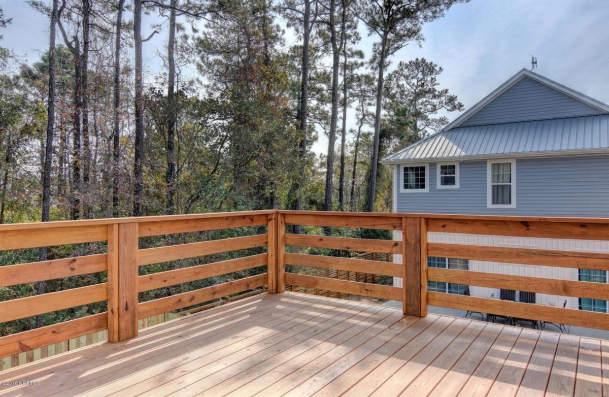 Modern Beach house Floor Plan with 4 Beds and Garage