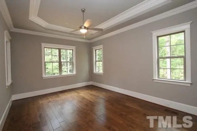 Traditional Craftsman house Plan with 4 Bedrooms and 3-Car Garage