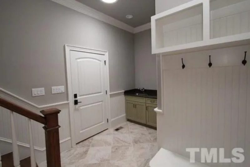 Traditional Craftsman house Plan with 4 Bedrooms and 3-Car Garage