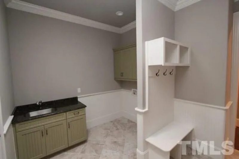 Traditional Craftsman house Plan with 4 Bedrooms and 3-Car Garage