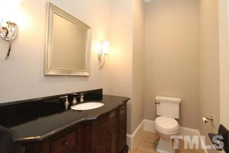 Traditional Craftsman house Plan with 4 Bedrooms and 3-Car Garage