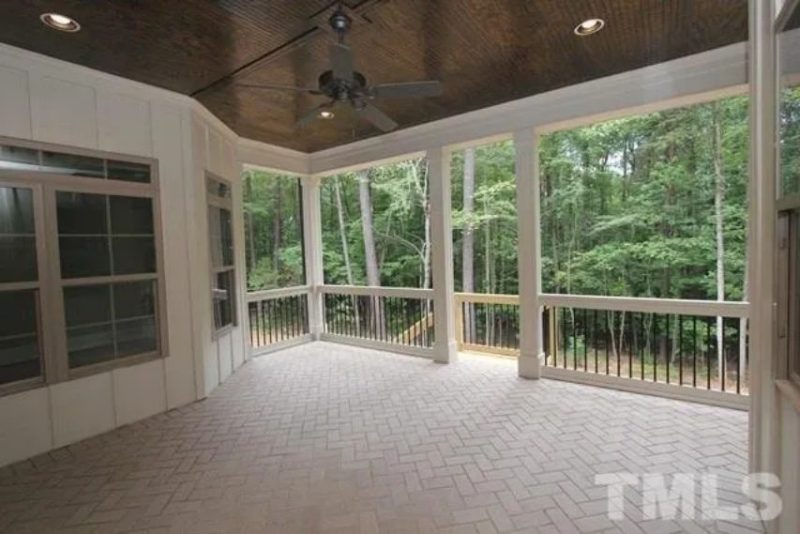 Traditional Craftsman house Plan with 4 Bedrooms and 3-Car Garage