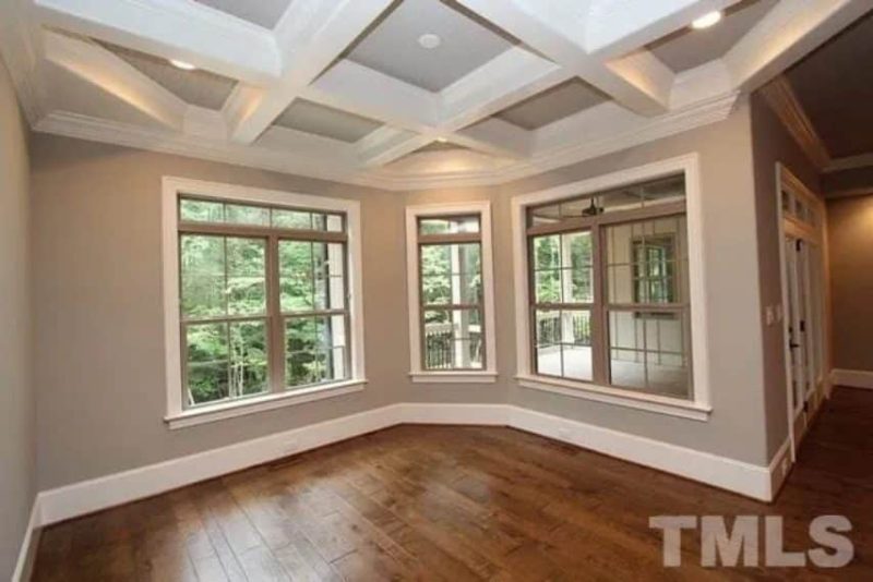 Traditional Craftsman house Plan with 4 Bedrooms and 3-Car Garage