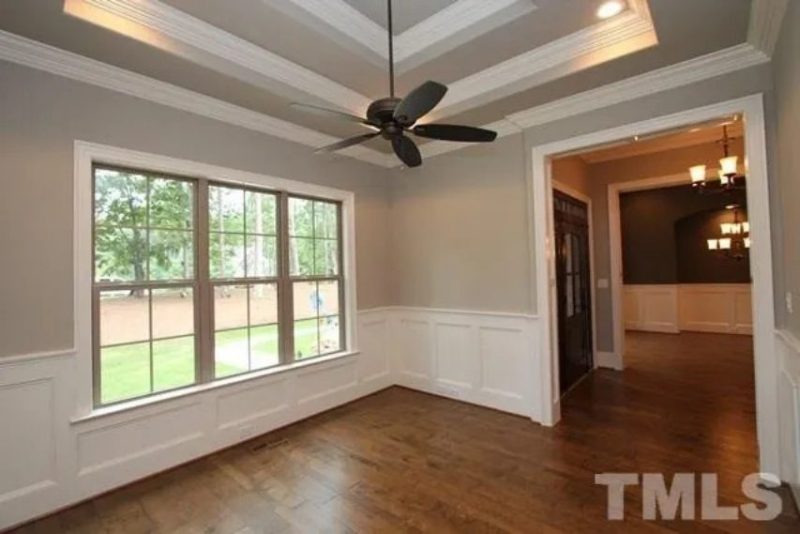 Traditional Craftsman house Plan with 4 Bedrooms and 3-Car Garage