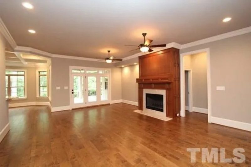 Traditional Craftsman house Plan with 4 Bedrooms and 3-Car Garage