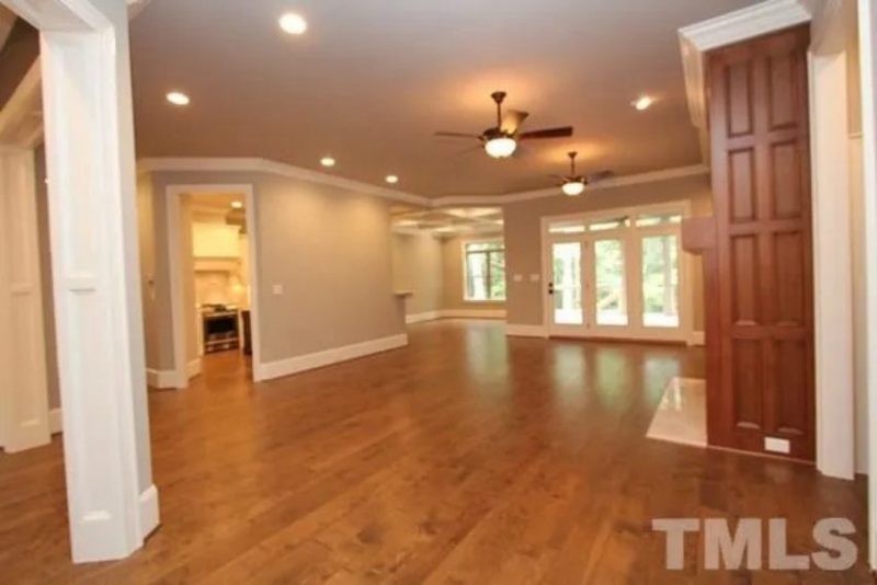 Traditional Craftsman house Plan with 4 Bedrooms and 3-Car Garage