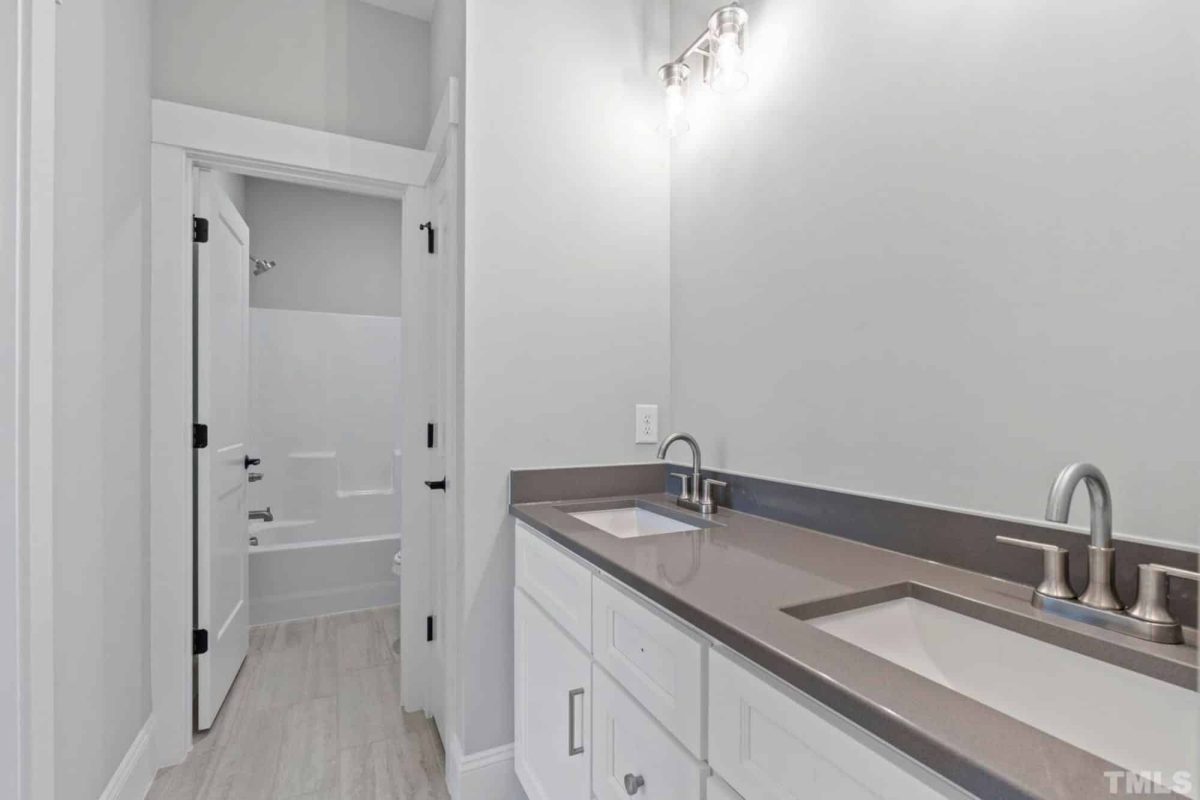 Traditional Craftsman house Plan with 2.5 Floors and Garage