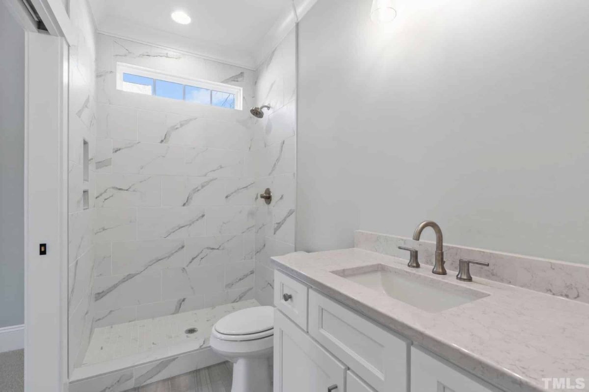 Traditional Craftsman house Plan with 2.5 Floors and Garage