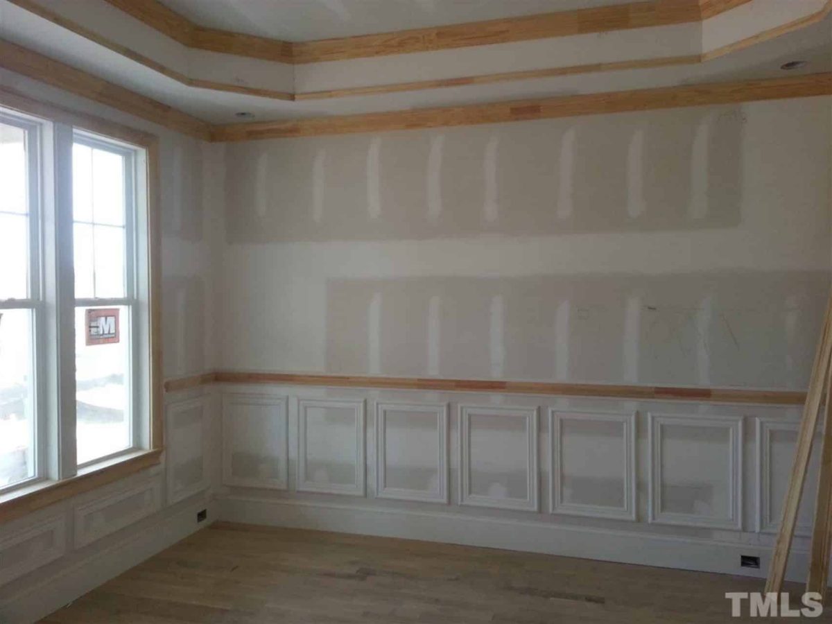 Traditional Craftsman house Plan with 2.5 Floors and Garage