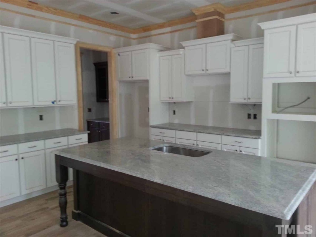 Traditional Craftsman house Plan with 2.5 Floors and Garage