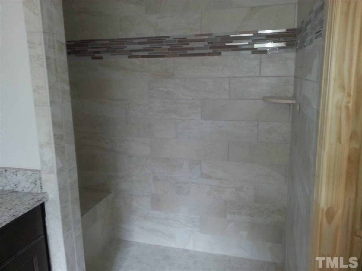 Traditional Craftsman house Plan with 2.5 Floors and Garage