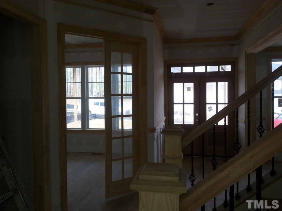 Traditional Craftsman house Plan with 2.5 Floors and Garage