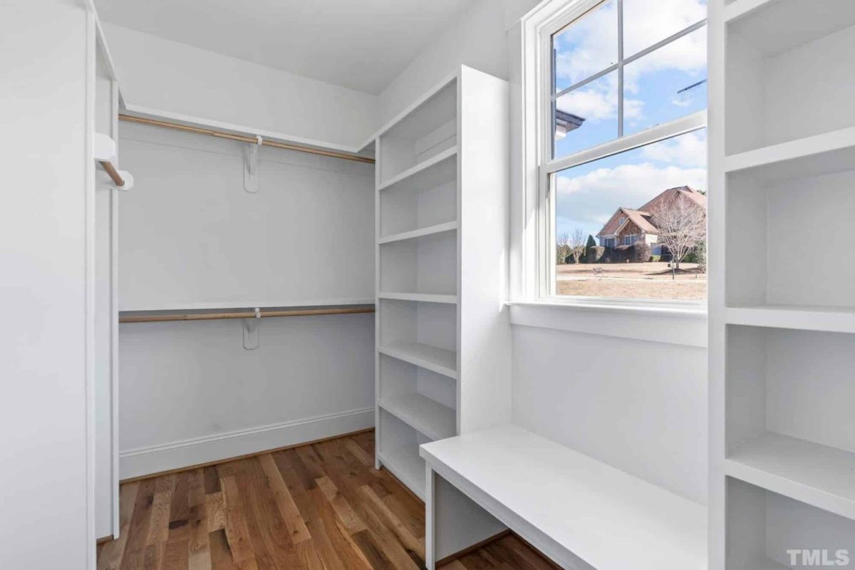 Traditional Craftsman house Plan with 2.5 Floors and Garage