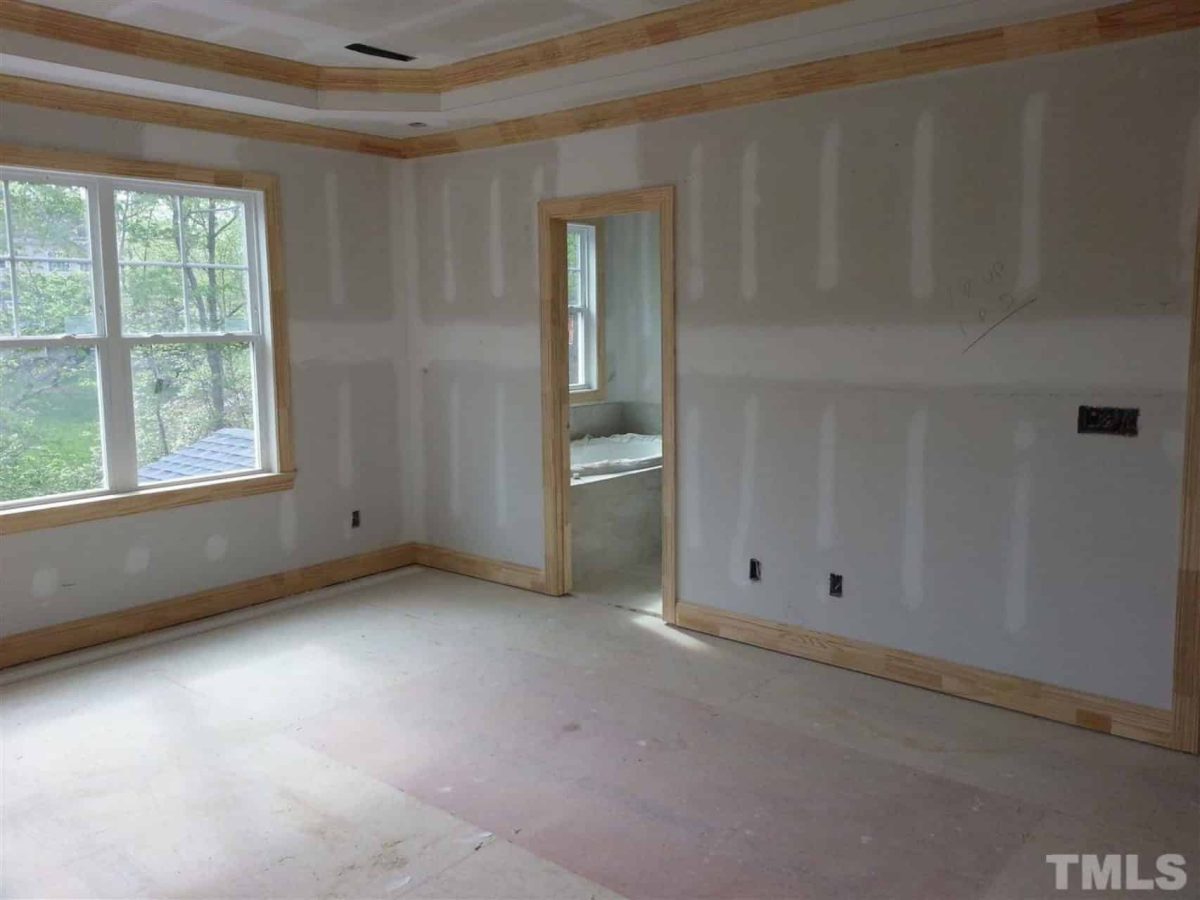 Traditional Craftsman house Plan with 2.5 Floors and Garage