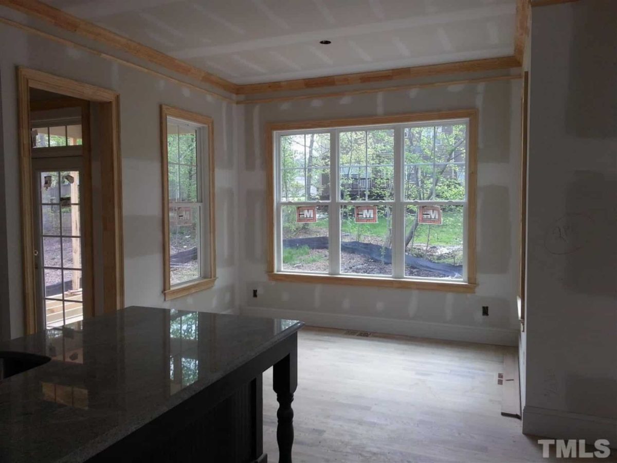 Traditional Craftsman house Plan with 2.5 Floors and Garage