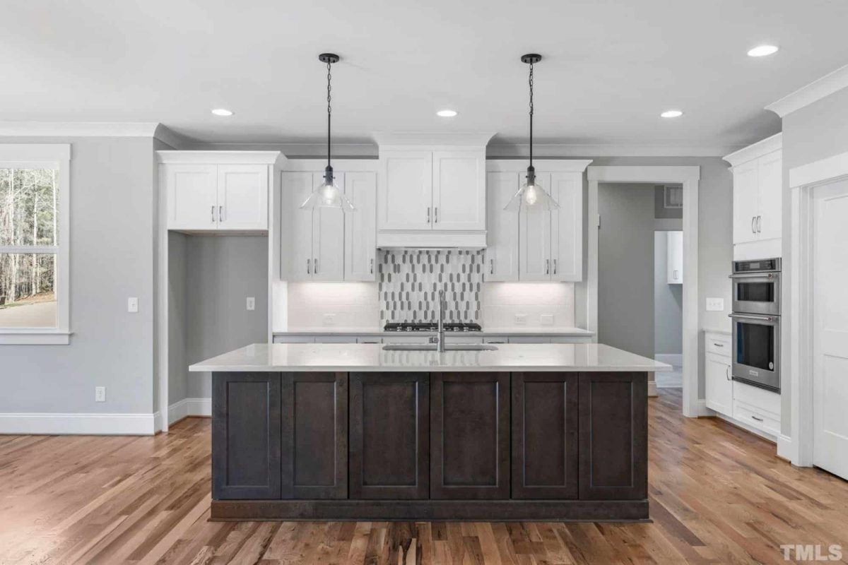 Traditional Craftsman house Plan with 2.5 Floors and Garage