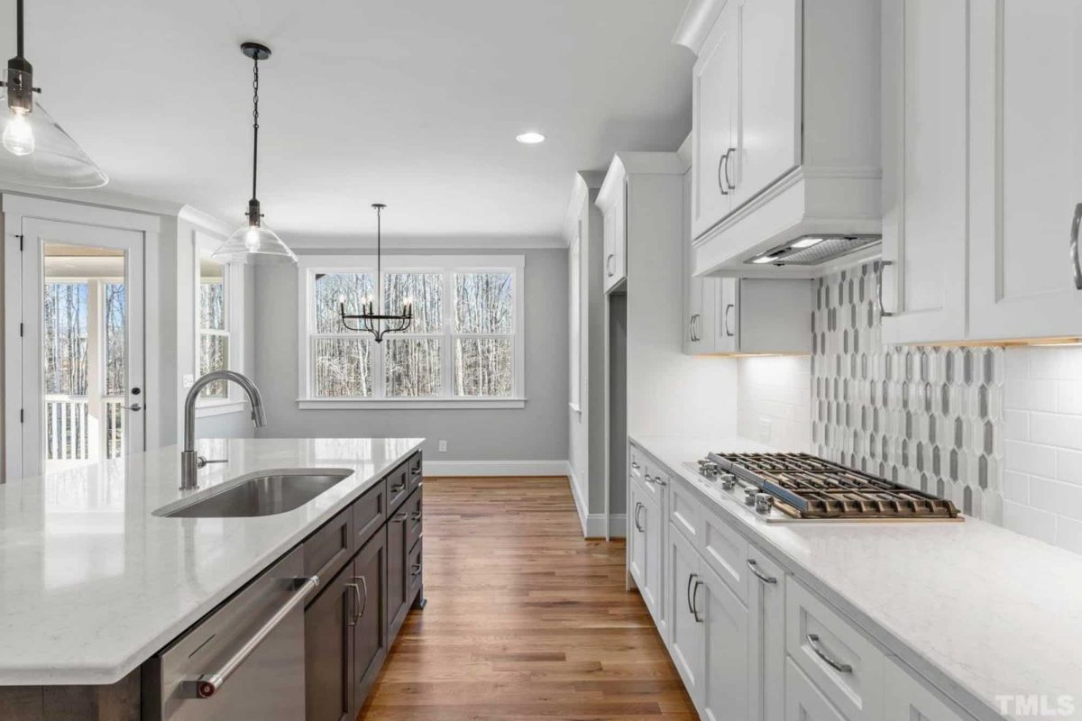 Traditional Craftsman house Plan with 2.5 Floors and Garage