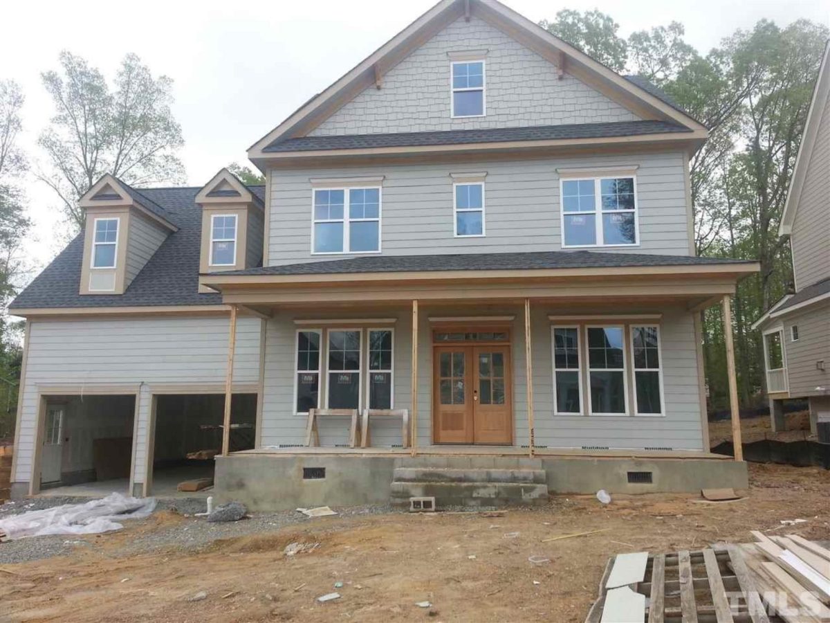 Traditional Craftsman house Plan with 2.5 Floors and Garage