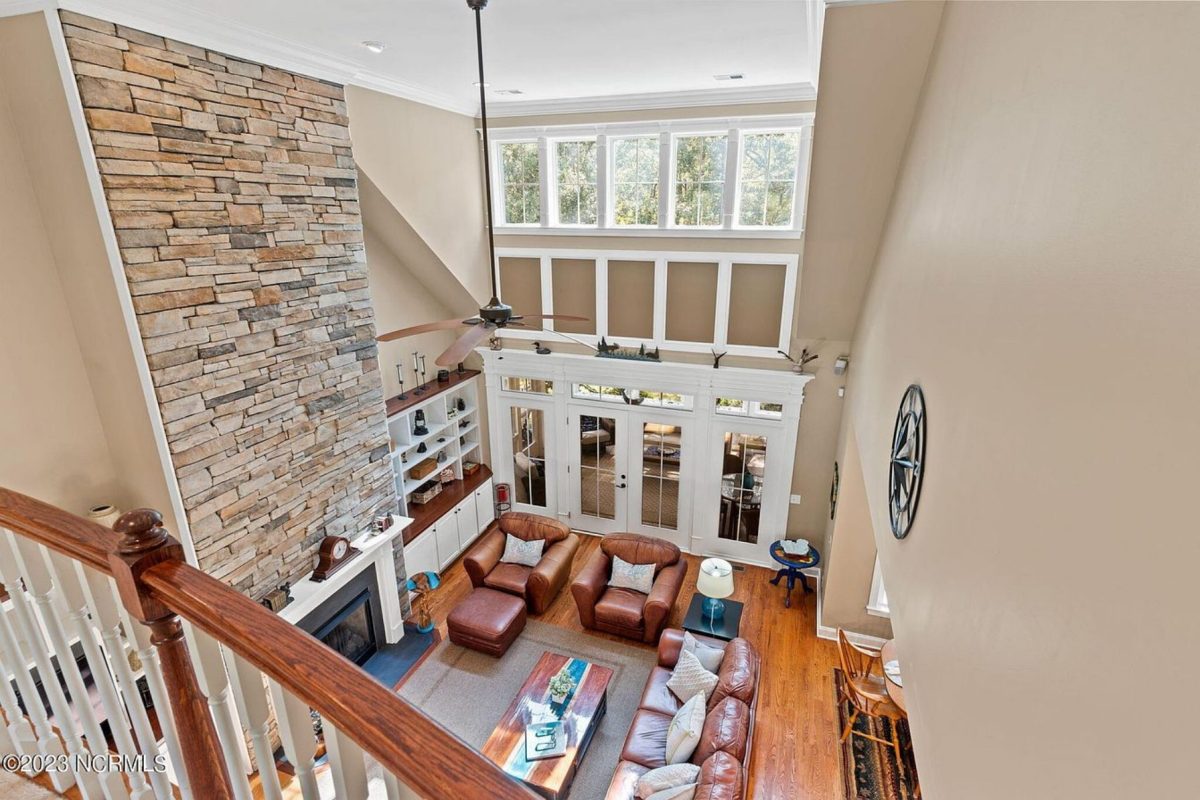 "2-story elegant colonial-style house with detailed CAD design plans"