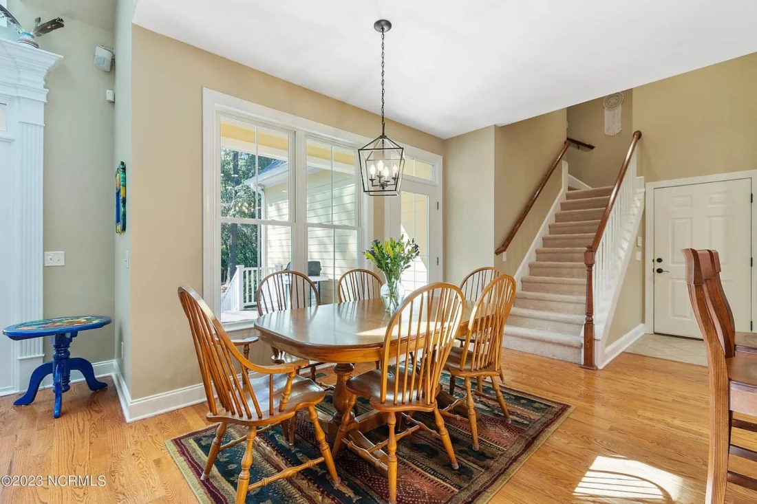 "2-story elegant colonial-style house plan with CAD designs"