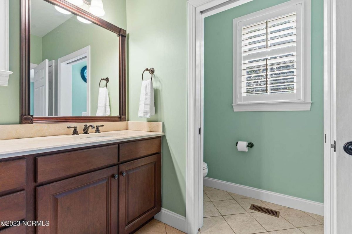 "Architectural CAD designs of a sophisticated two-story colonial style house"