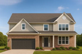 Front view of a Traditional Colonial style two-story house featuring brick and horizontal lap siding, black garage door, and symmetrical windows