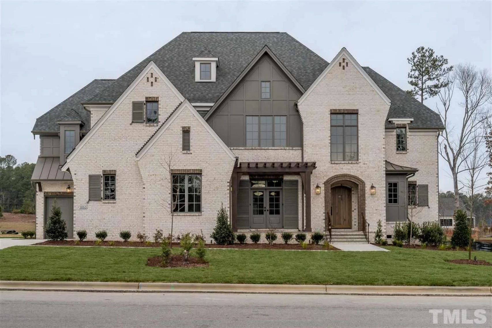 19-1766 HOUSE PLAN - Elegant Tudor-Style House Plan – 5 Bed, 5+ Bath, 4,183 Sq. Ft. 3 Elegant Tudor-Style House Plan with Luxurious Layout