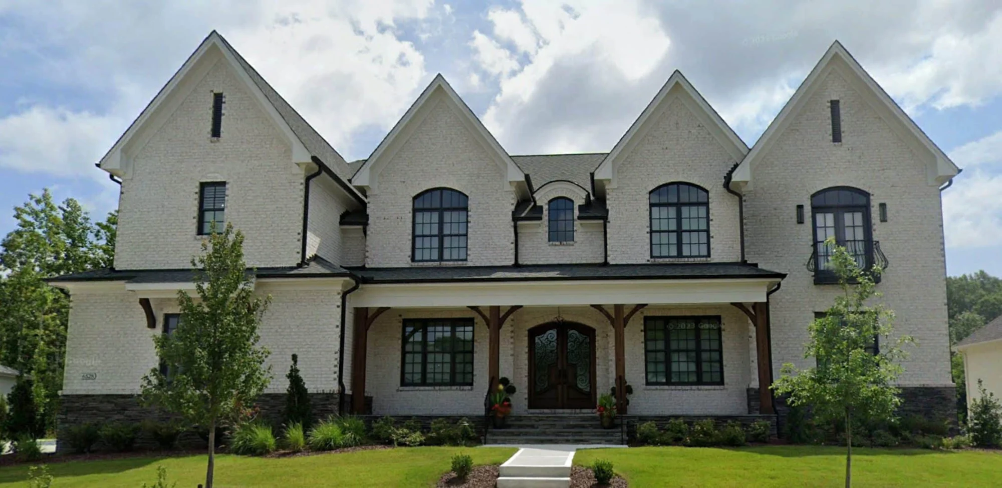 Luxury 2-Story House Plan with 6 Bedrooms & 8 Bathrooms