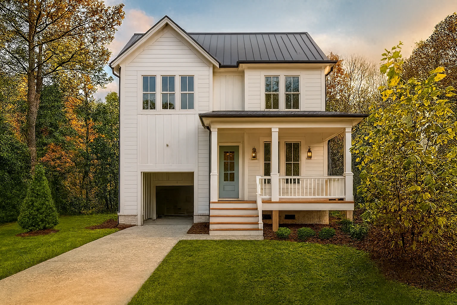 Front exterior view of a Modern Farmhouse style home with board and batten siding, standing seam metal roof, covered porch, and front-entry garage