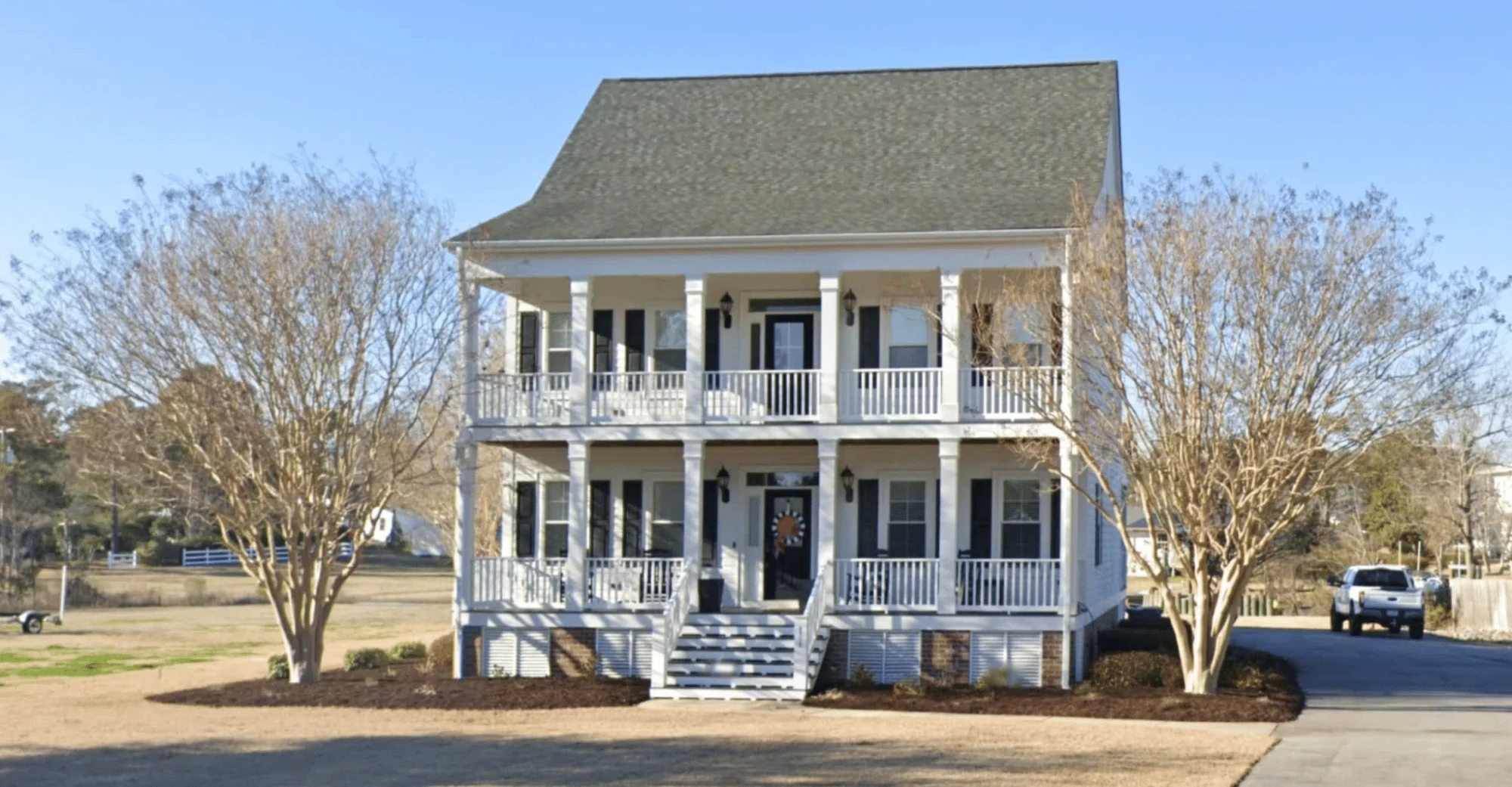 Colonial house plan with 3,452 heated sq. ft., open layout, 2 stories