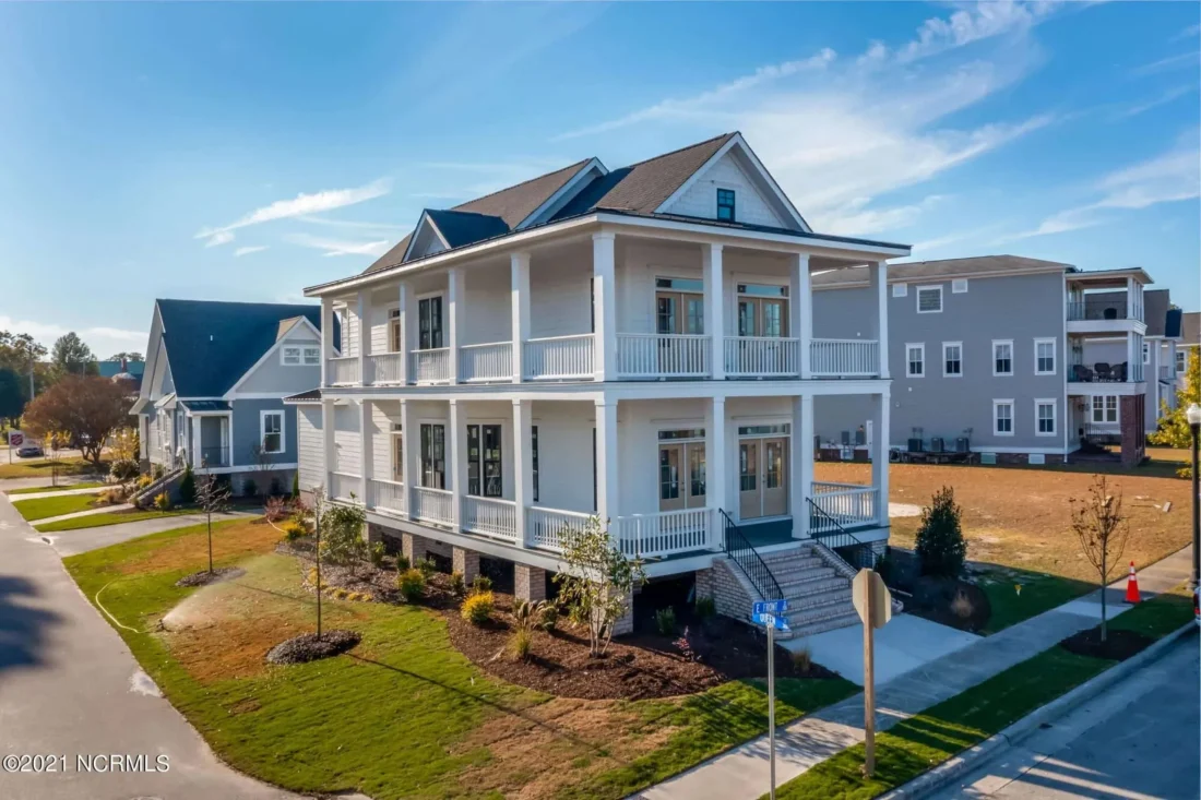 Elegant 2-Story Charleston House Plan with Brick & Siding Design