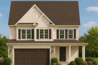 Front elevation of a Traditional Colonial style two-story home featuring horizontal lap siding, shake accents, and stone base detailing with symmetrical windows and covered porch entry.