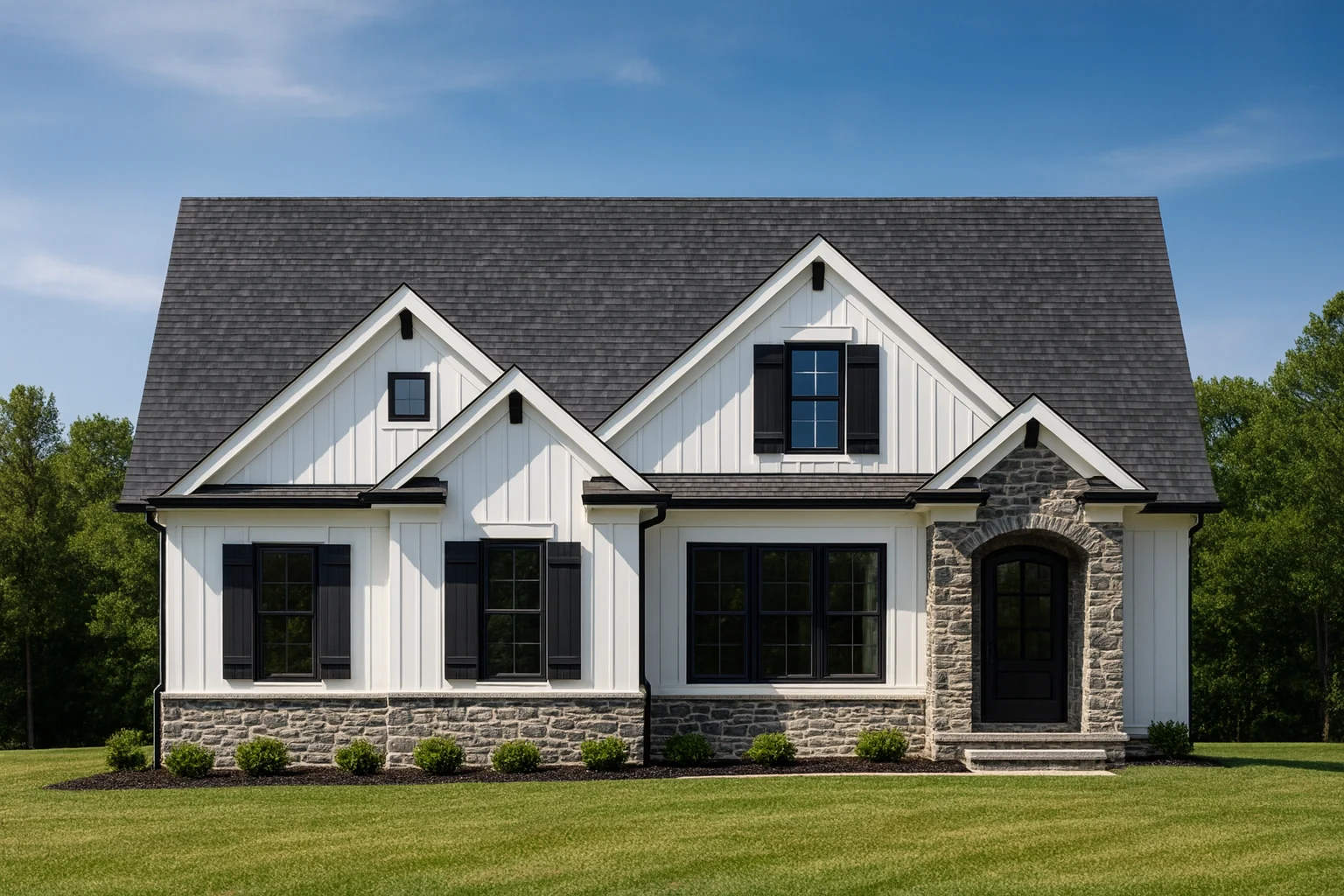 Front view of a Traditional Transitional style home featuring a mix of horizontal lap siding and stone exterior with dark shutters and a welcoming arched entryway