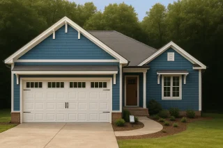 Front elevation of a Craftsman Ranch house featuring blue horizontal siding, shingle gables, white trim, and brick water-table detailing
